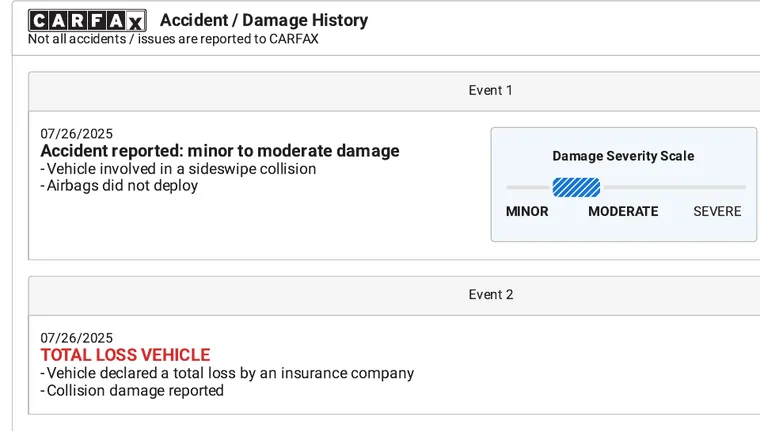 A CARFAX report's accident and damage history, flagging a total loss vehicle